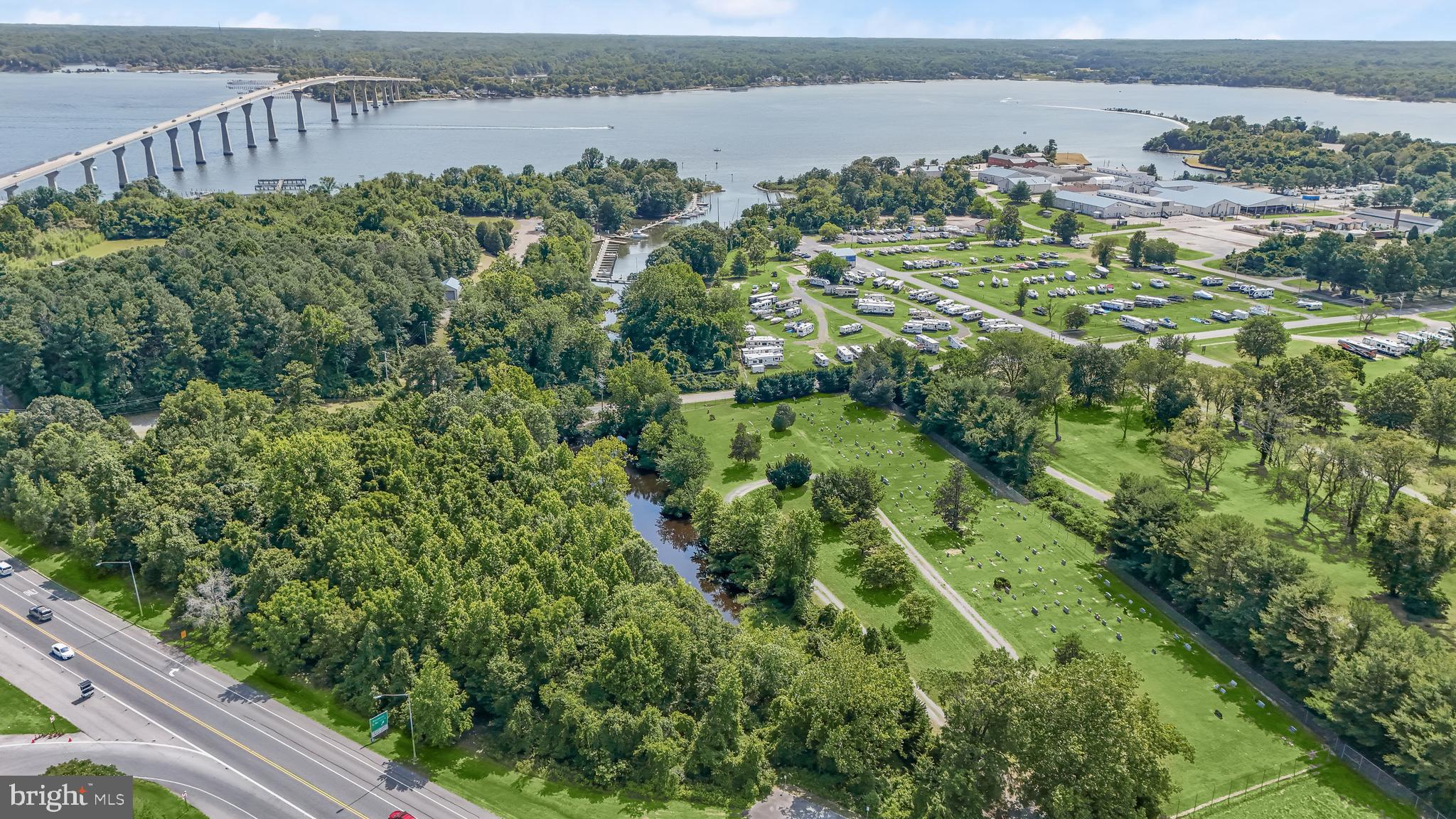 14055 Solomons Island Road South Solomons, MD 20688 - Photo 12 of 17 a view of a lake with a mountain in the back