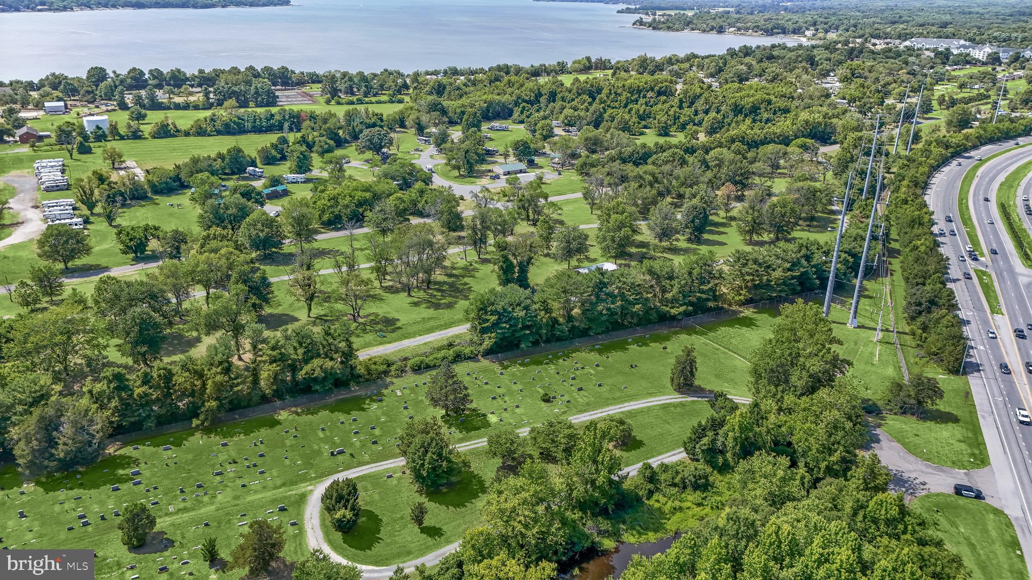 14055 Solomons Island Road South Solomons, MD 20688 - Photo 16 of 17 a view of a garden with a building