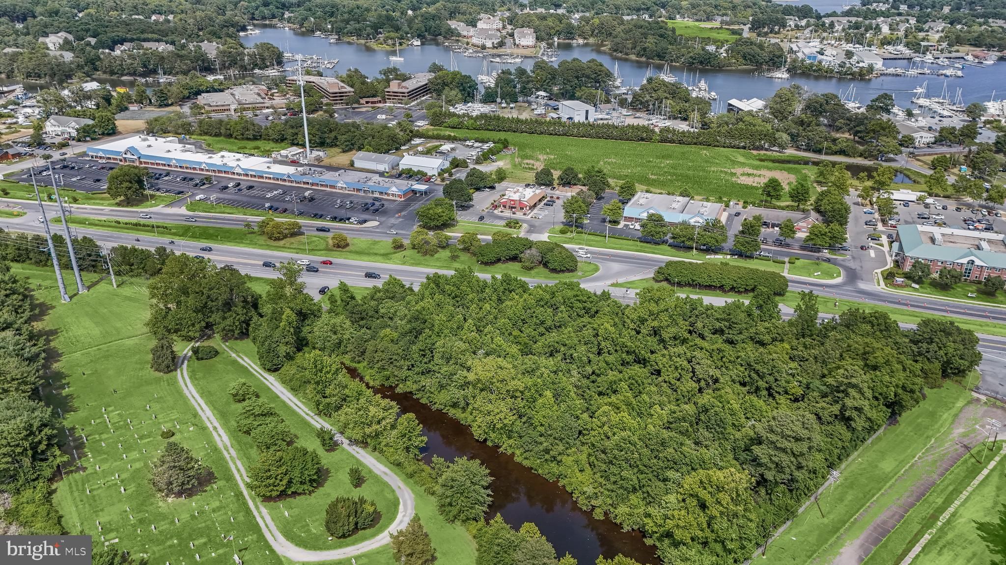 14055 Solomons Island Road South Solomons, MD 20688 - Photo 3 of 17 an aerial view of a house with yard swimming pool and outdoor seating