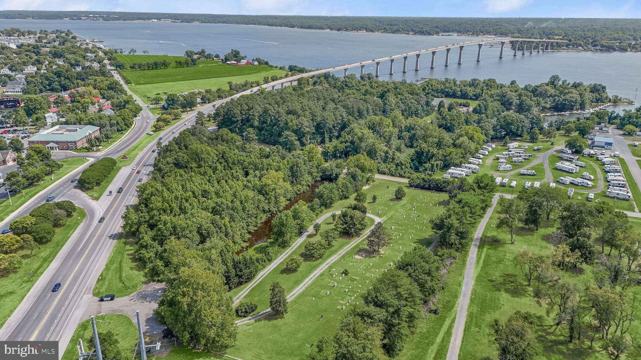 14055 Solomons Island Road South Solomons, MD 20688 - Photo 8 of 17 an aerial view of a houses with a yard