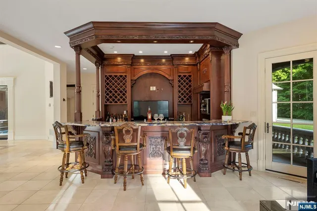 a view of a dining room with furniture and window
