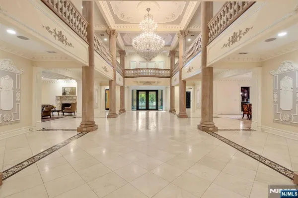 a view of an entryway with a chandelier