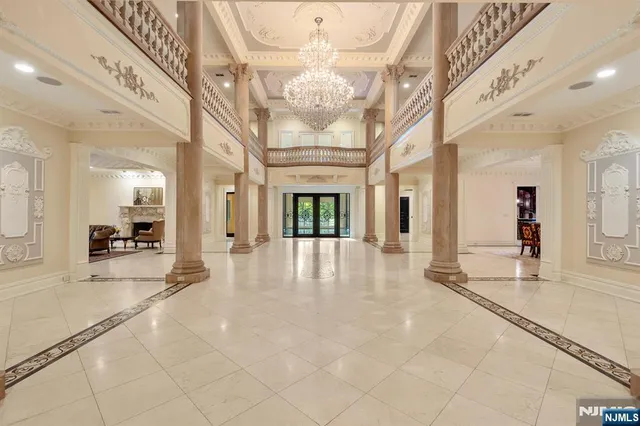 a view of an entryway with a chandelier