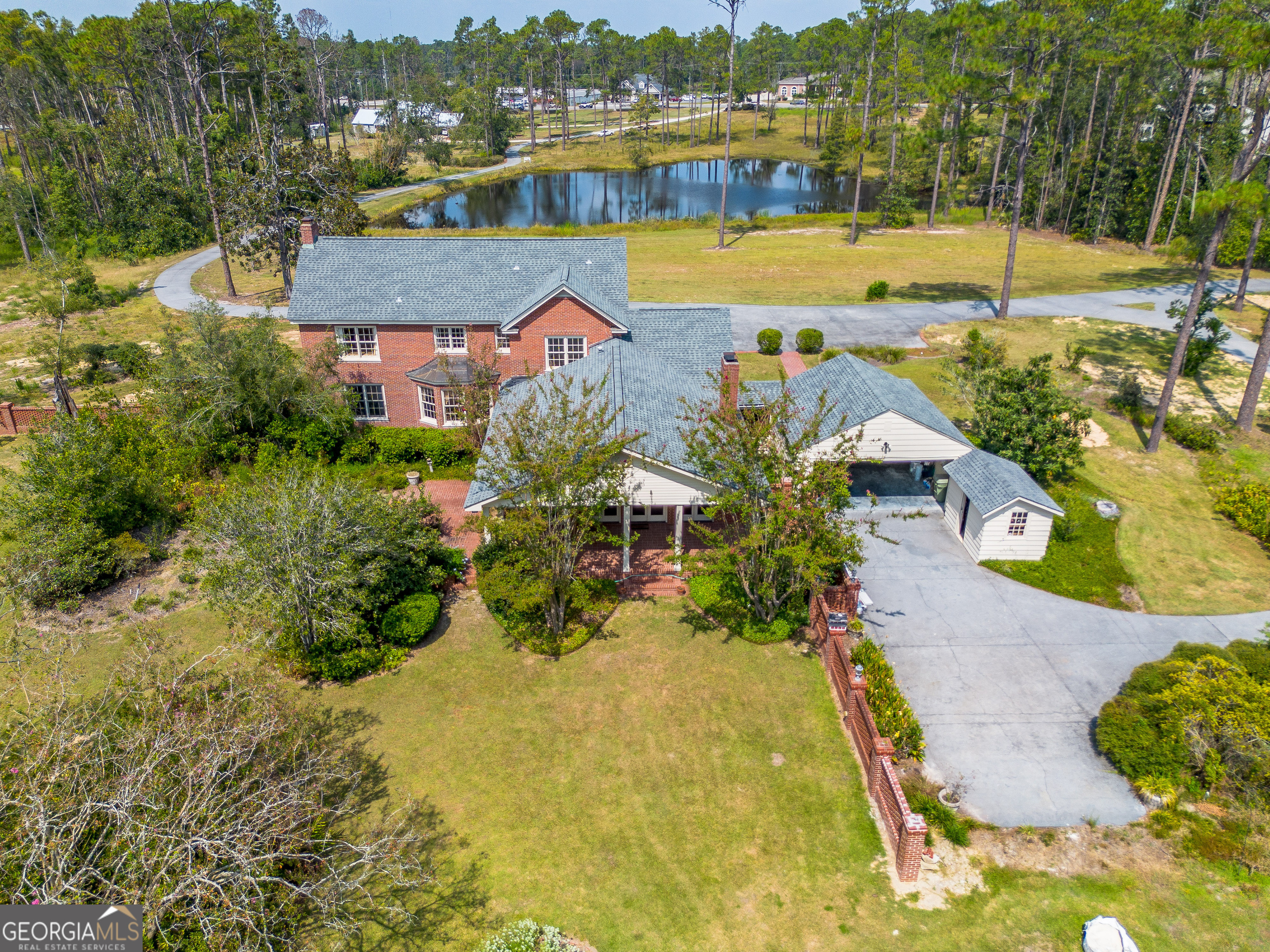 1602 Ward St Extension West Douglas, GA 31533 - Photo 6 of 70 an aerial view of residential houses with outdoor space and river