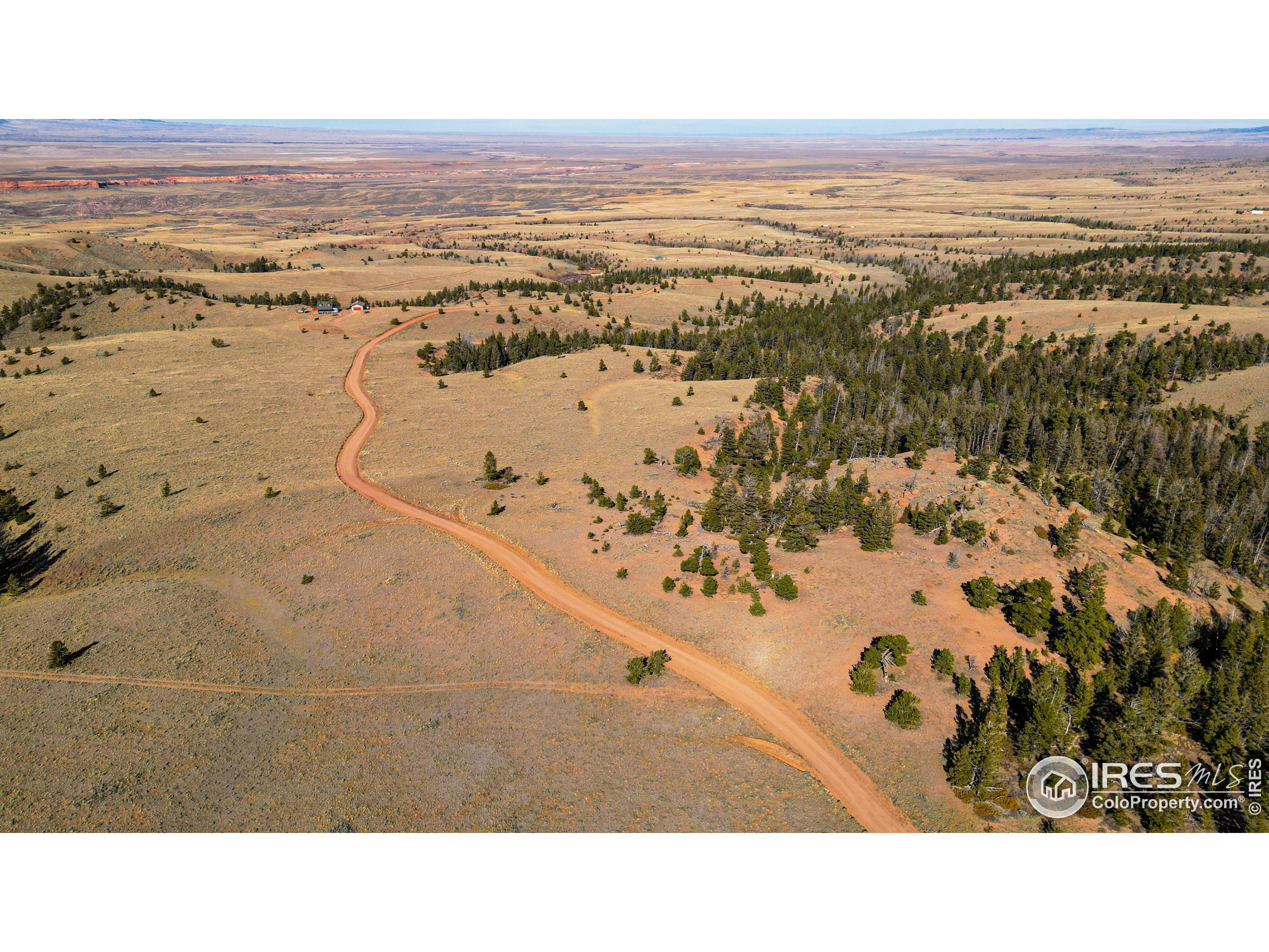 0 Wilderness Ranch Road Livermore, CO 80536 - Photo 15 of 16 a view of city and ocean