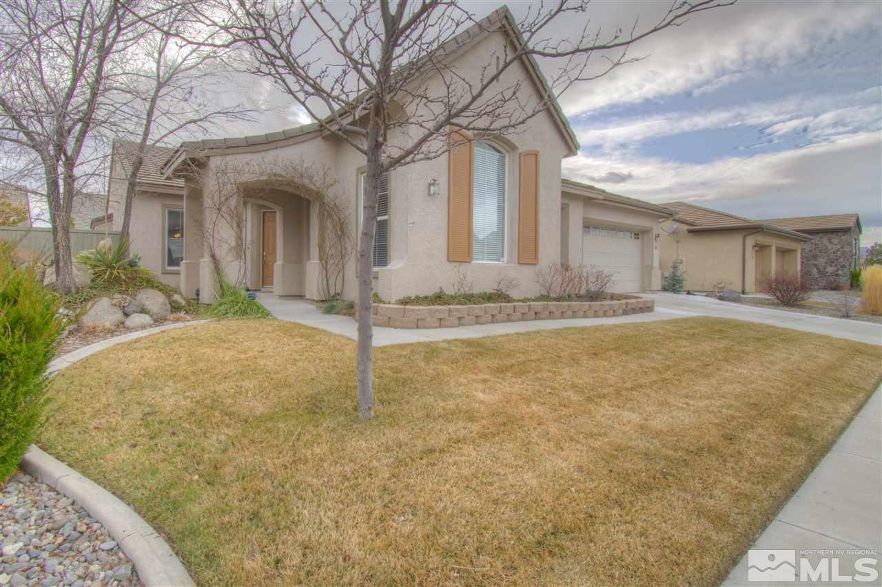 1652 Broadstone Way Reno, NV 89521 - Photo 1 of 25 a view of a house with a snow in the yard