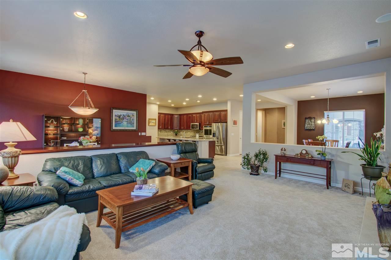 1652 Broadstone Way Reno, NV 89521 - Photo 14 of 25 a living room with furniture and kitchen view