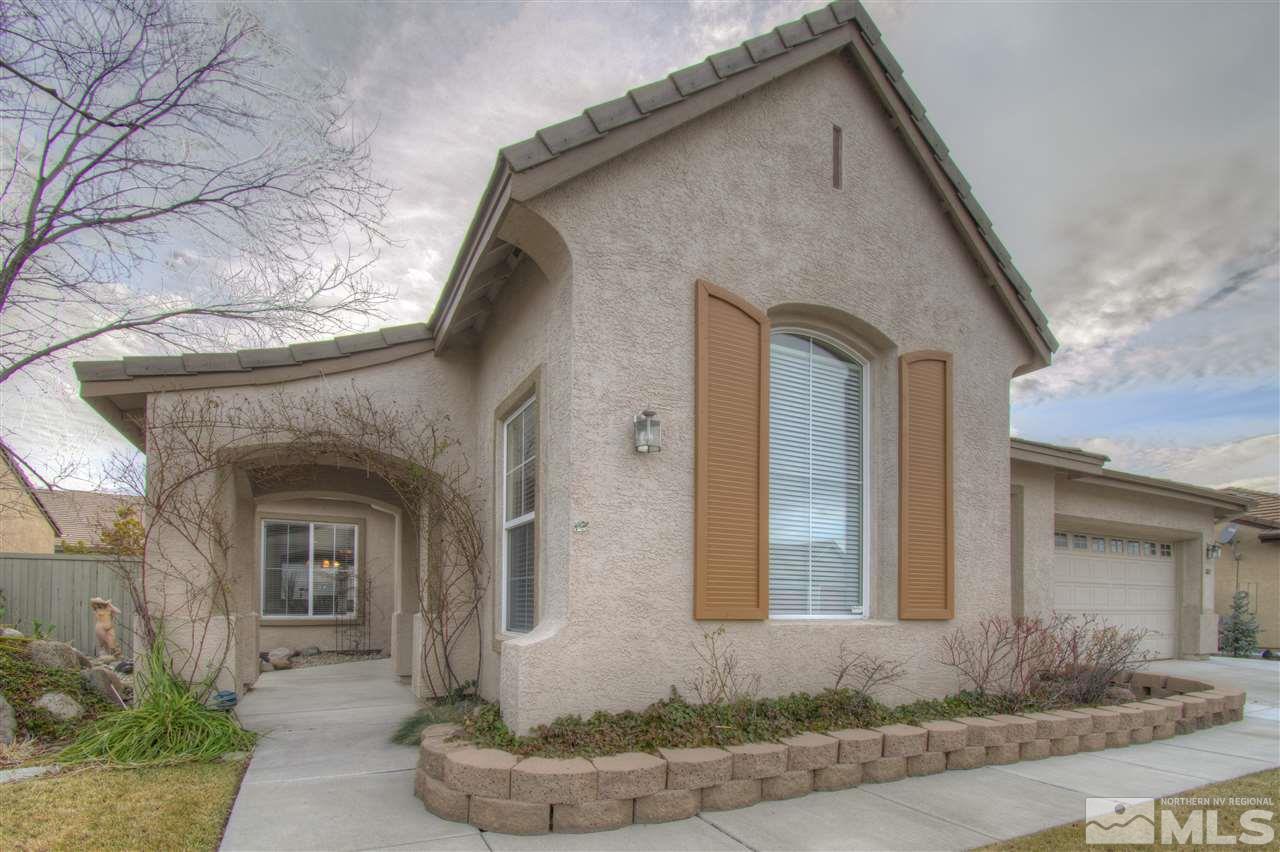1652 Broadstone Way Reno, NV 89521 - Photo 2 of 25 a front view of a house with a yard