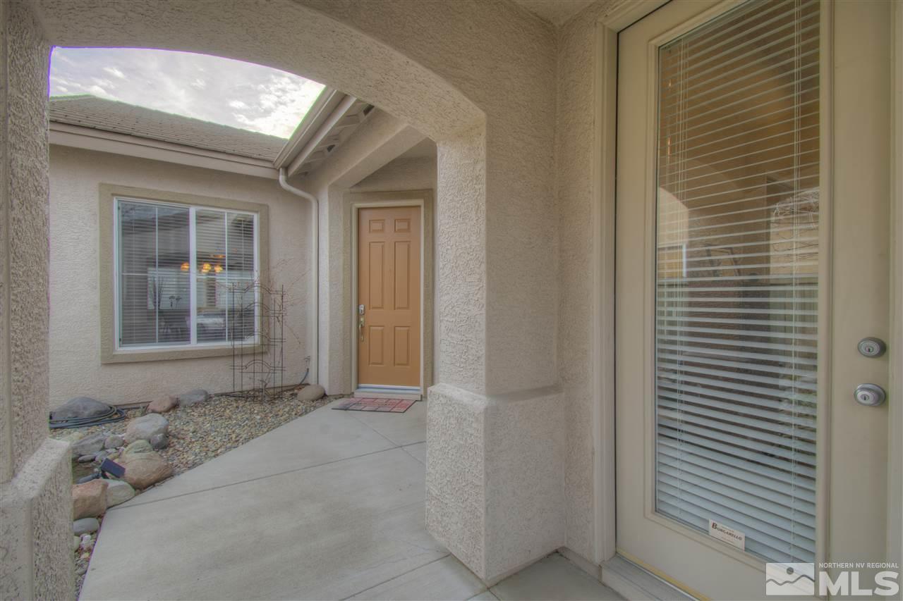 1652 Broadstone Way Reno, NV 89521 - Photo 4 of 25 a view of a door and a window