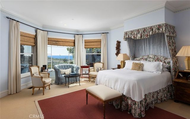 a bed room with a bed and a couch