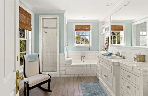 a bathroom with sink toilet and bathtub