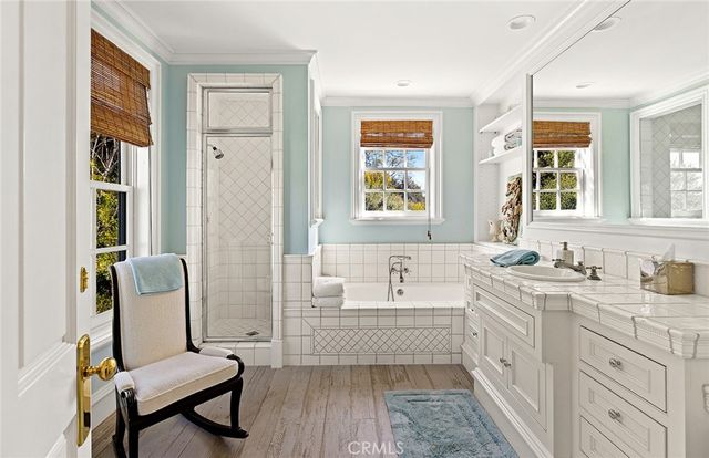 a bathroom with sink toilet and bathtub
