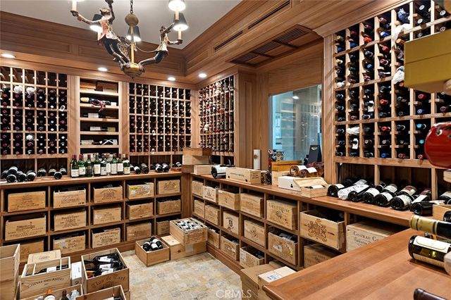 a view of a two chairs with sitting area in back yard of the house