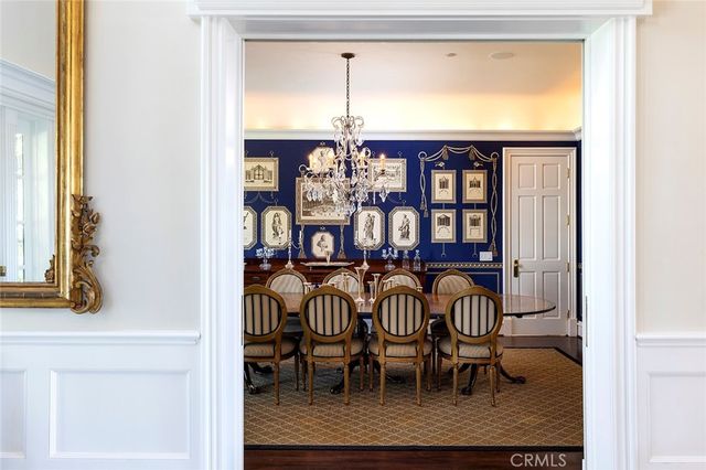 a view of a dining room with furniture and window