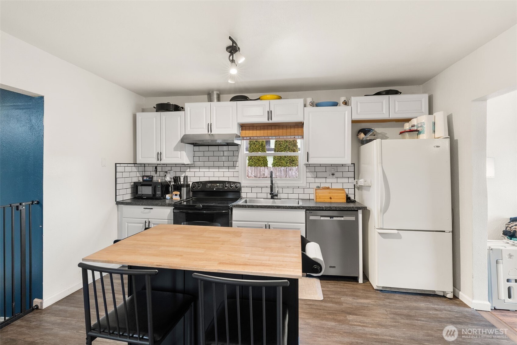 2046 Southwest Salsbury Avenue Chehalis, WA 98532 - Photo 14 of 36 a kitchen with refrigerator and stove top oven
