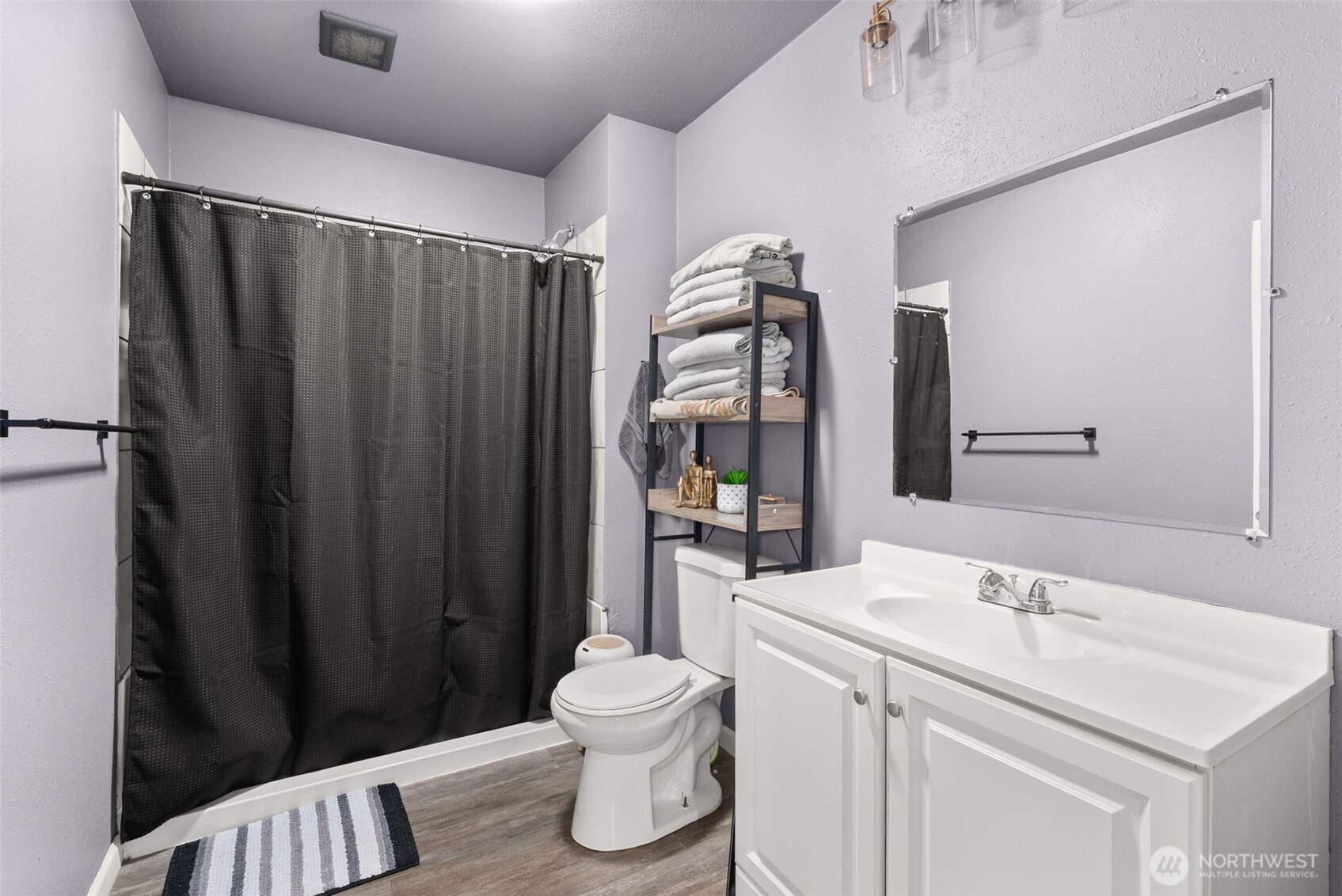 2046 Southwest Salsbury Avenue Chehalis, WA 98532 - Photo 20 of 36 a bathroom with a sink toilet and shower