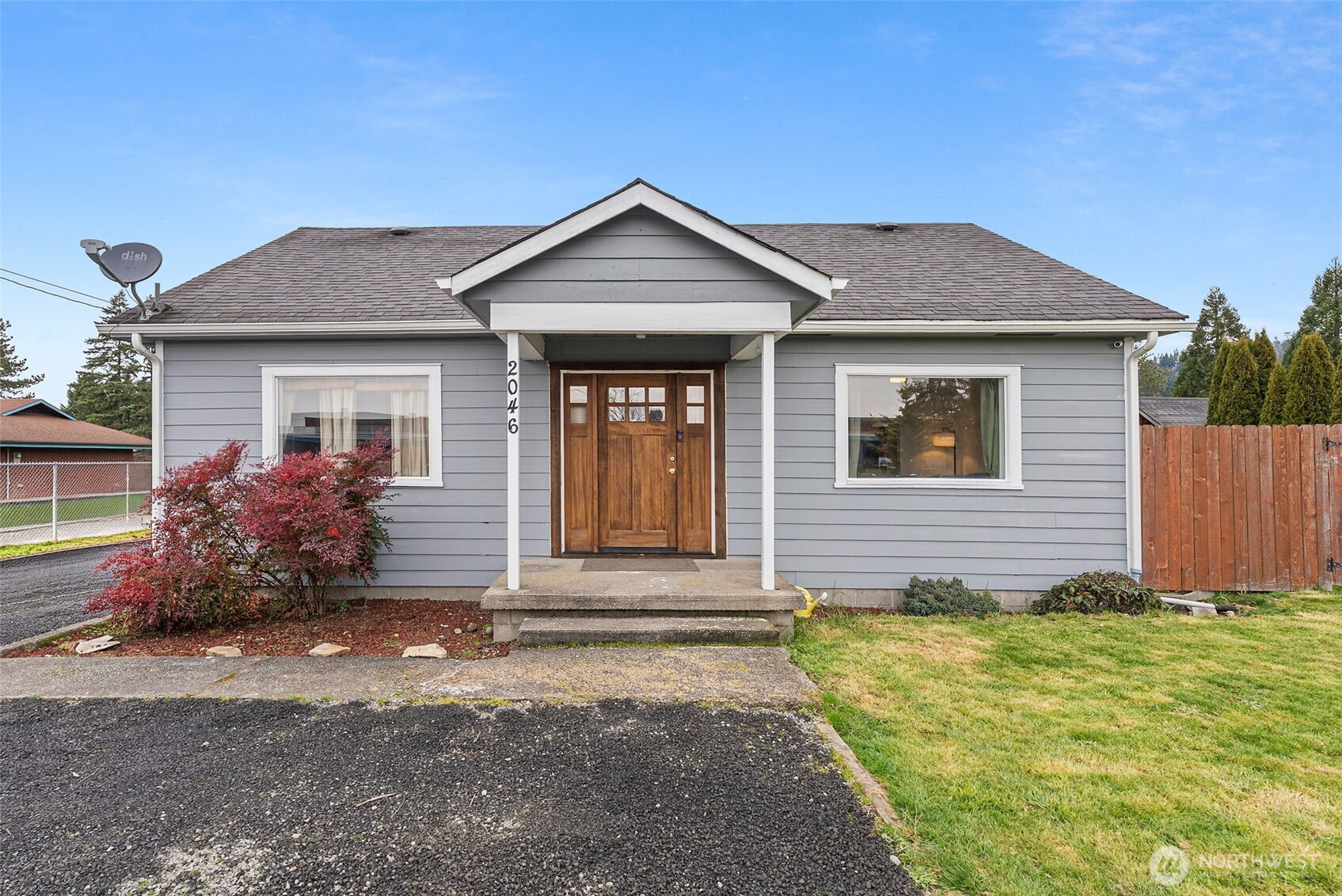 2046 Southwest Salsbury Avenue Chehalis, WA 98532 - Photo 2 of 36 a front view of a house with garden
