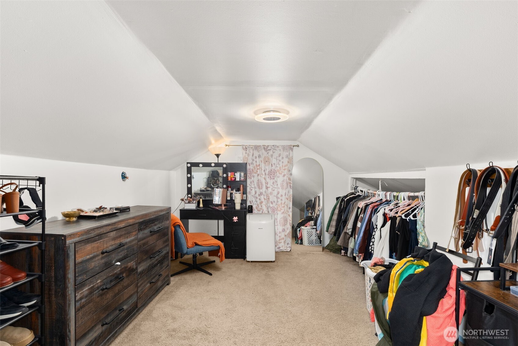 2046 Southwest Salsbury Avenue Chehalis, WA 98532 - Photo 28 of 36 a view of walk in closet with clothes and shoes