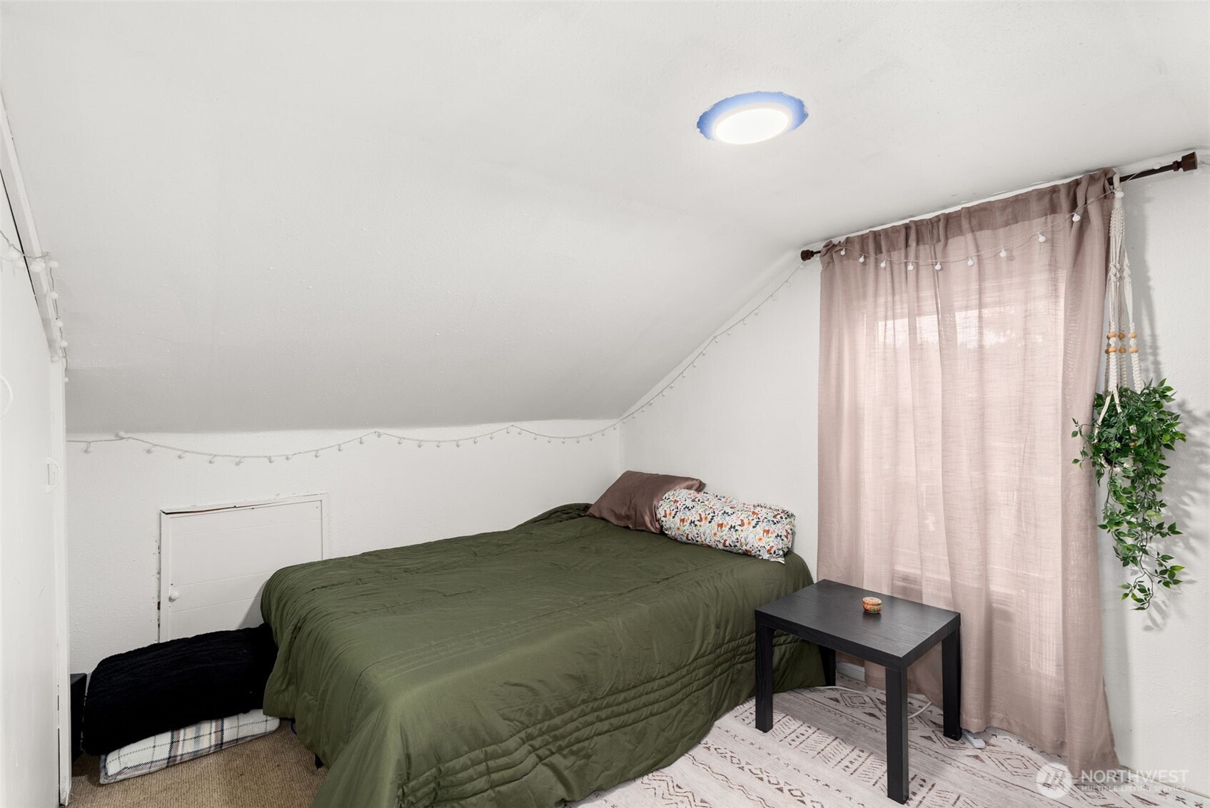 2046 Southwest Salsbury Avenue Chehalis, WA 98532 - Photo 29 of 36 a bedroom with a bed and a window