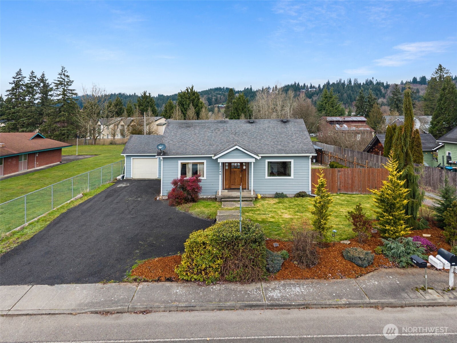 2046 Southwest Salsbury Avenue Chehalis, WA 98532 - Photo 3 of 36 a aerial view of a house next to a yard