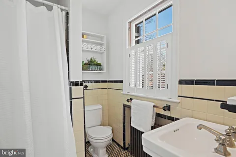 a bathroom with a sink and a toilet