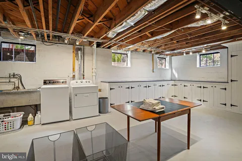 a utility room with cabinets