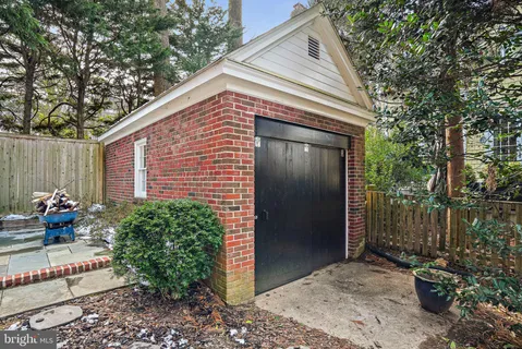 a backyard of a house with seating space