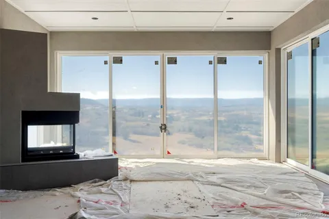 a bathroom with a bathtub and a window