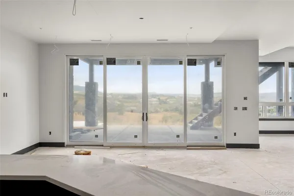 a view of an empty room with window
