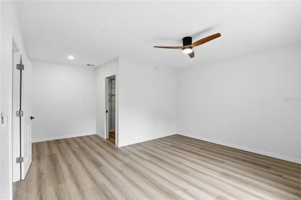 a bathroom with a sink a mirror and a shower