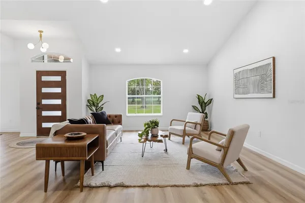 a view of a livingroom with furniture