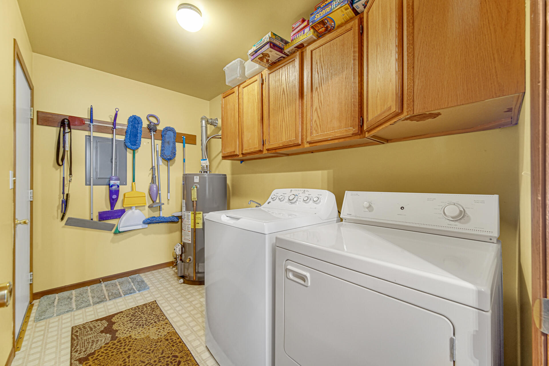 8613 Van Buren Street Merrillville, IN 46410 - Photo 15 of 18 a view of storage and utility room with washer and dryer