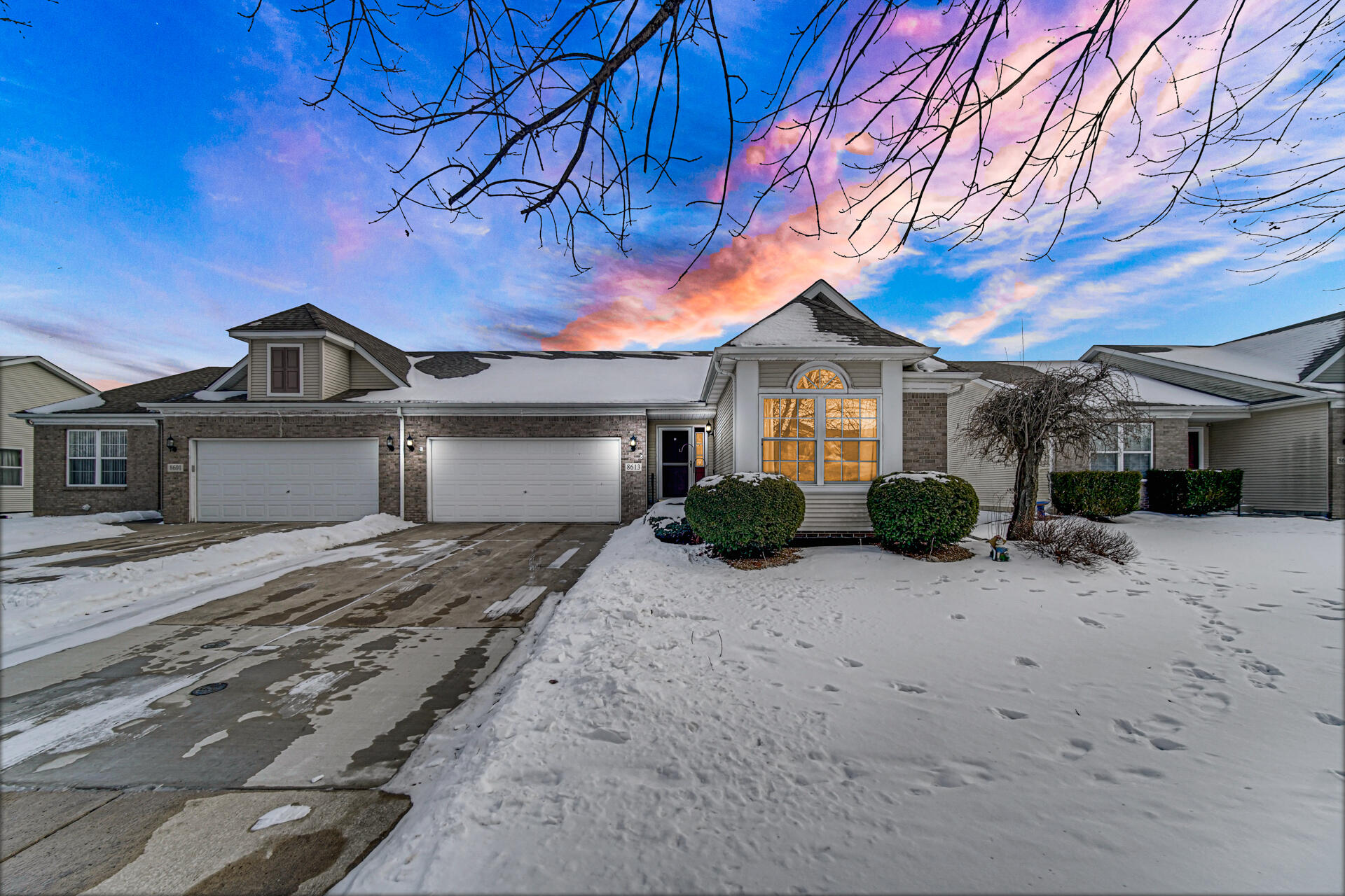 8613 Van Buren Street Merrillville, IN 46410 - Photo 18 of 18 a front view of a house with a yard