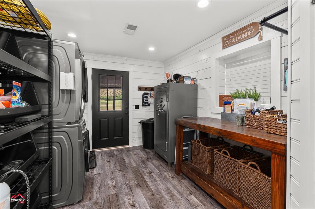 10073 Ferry Lake Road Oil City, LA 71061 - Photo 14 of 39 a view of a kitchen with fridge and workspace