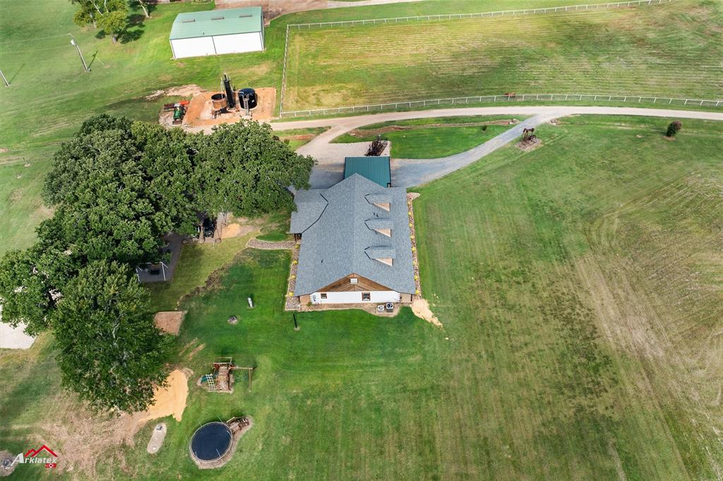10073 Ferry Lake Road Oil City, LA 71061 - Photo 3 of 39 a view of a swimming pool and outdoor space