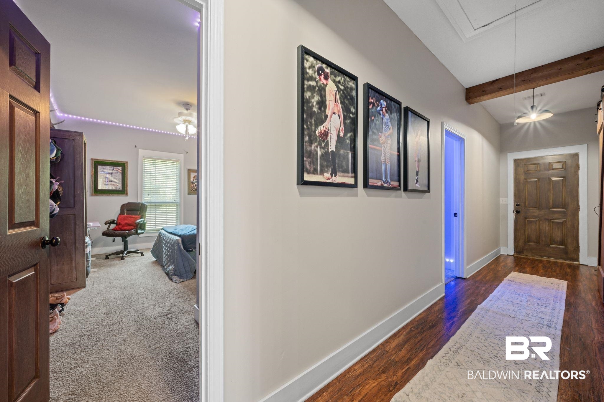 15635 North A N Brady Road Bay Minette, AL 36507 - Photo 27 of 51 Corridor featuring lofted ceiling with beams and dark hardwood / wood-style floors