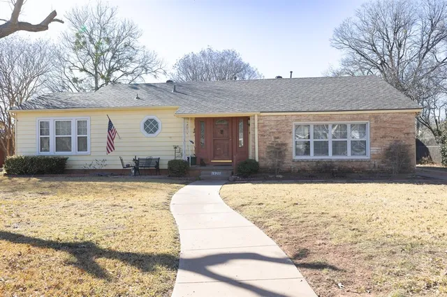 a front view of a house with swimming pool