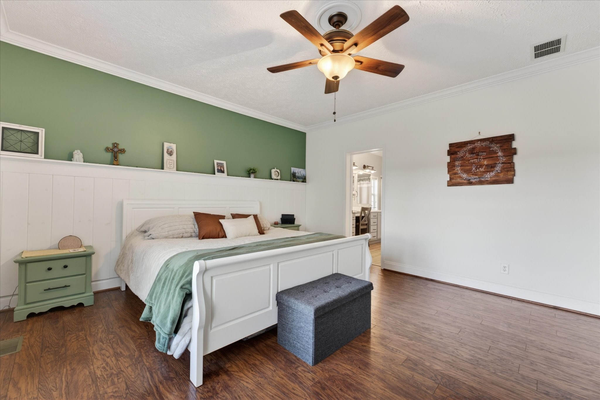2108 Buckskin Court Spring Hill, TN 37174 - Photo 19 of 39 a bedroom with a bed and a chandelier
