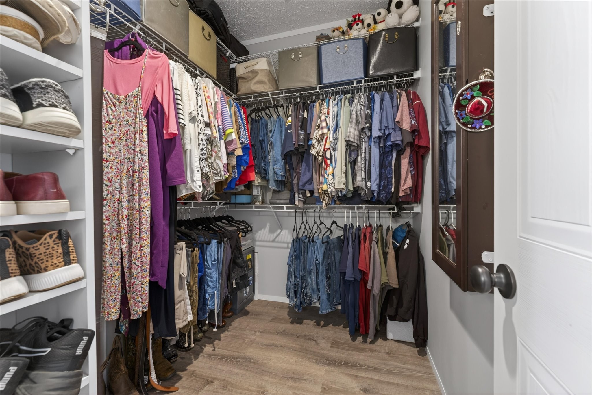 2108 Buckskin Court Spring Hill, TN 37174 - Photo 21 of 39 a view of walk in closet with clothes