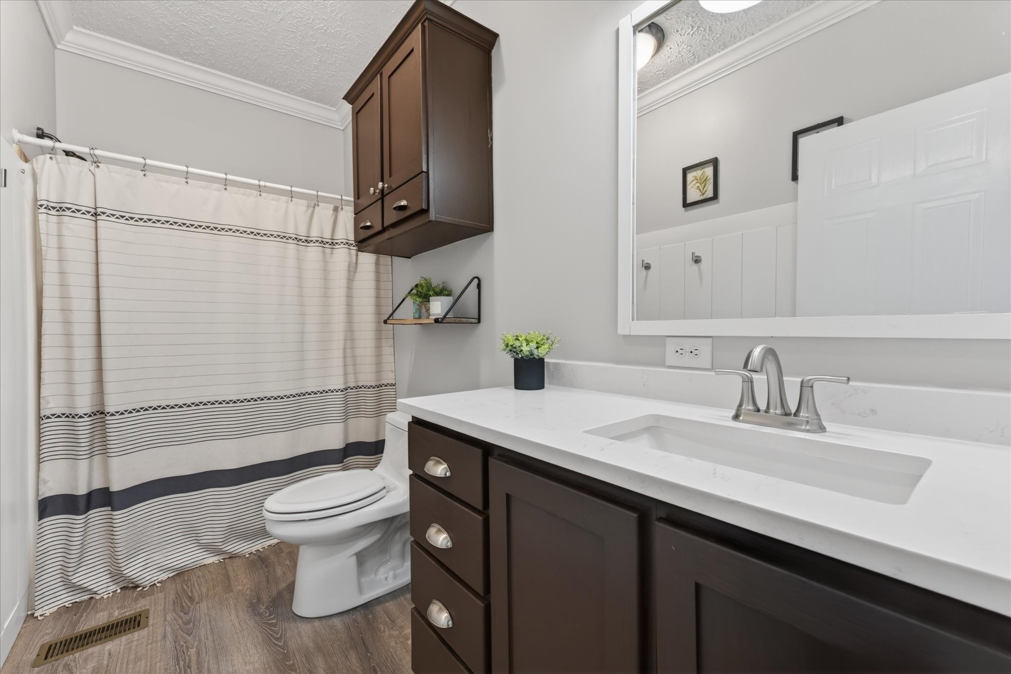 2108 Buckskin Court Spring Hill, TN 37174 - Photo 23 of 39 a bathroom with a sink a toilet and shower