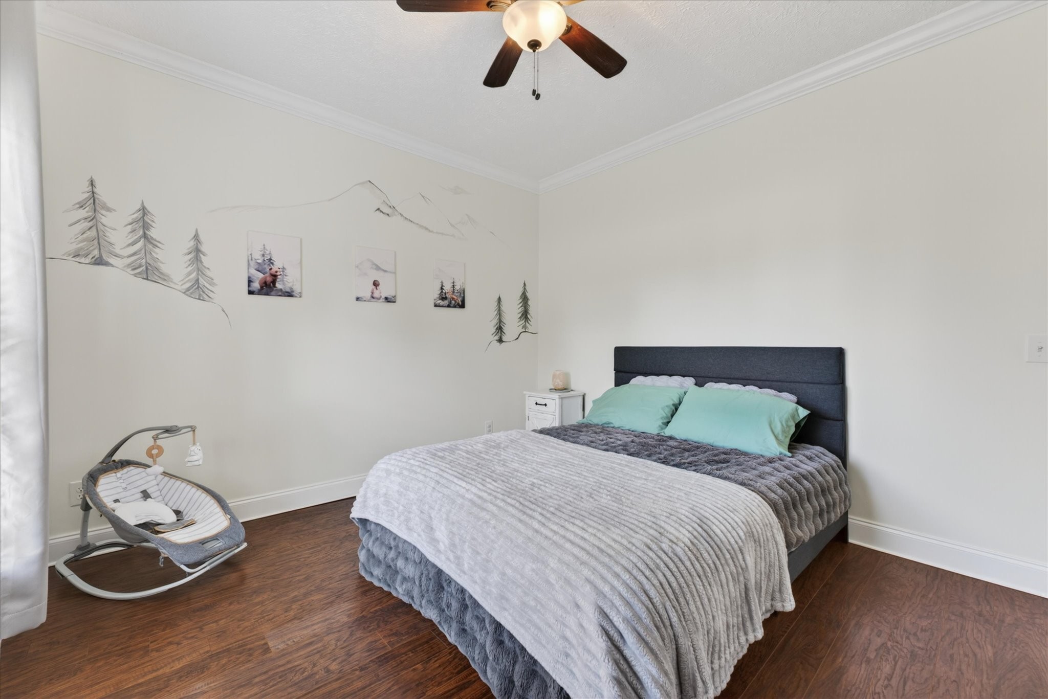 2108 Buckskin Court Spring Hill, TN 37174 - Photo 24 of 39 a bedroom with a bed and wooden floor