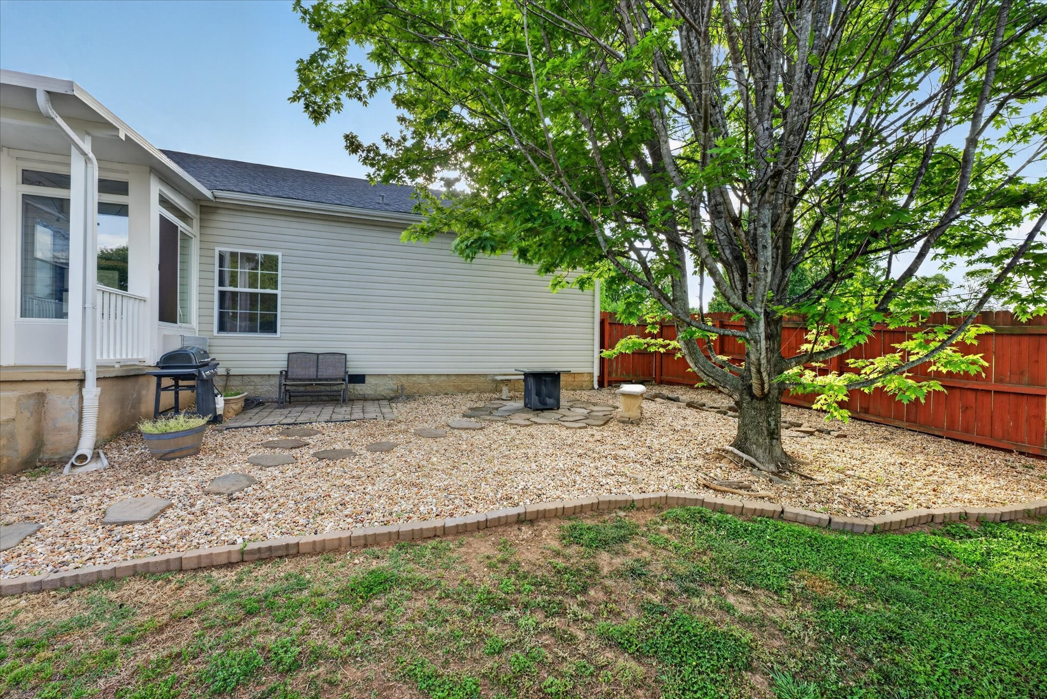 2108 Buckskin Court Spring Hill, TN 37174 - Photo 29 of 39 a backyard of a house with seating space