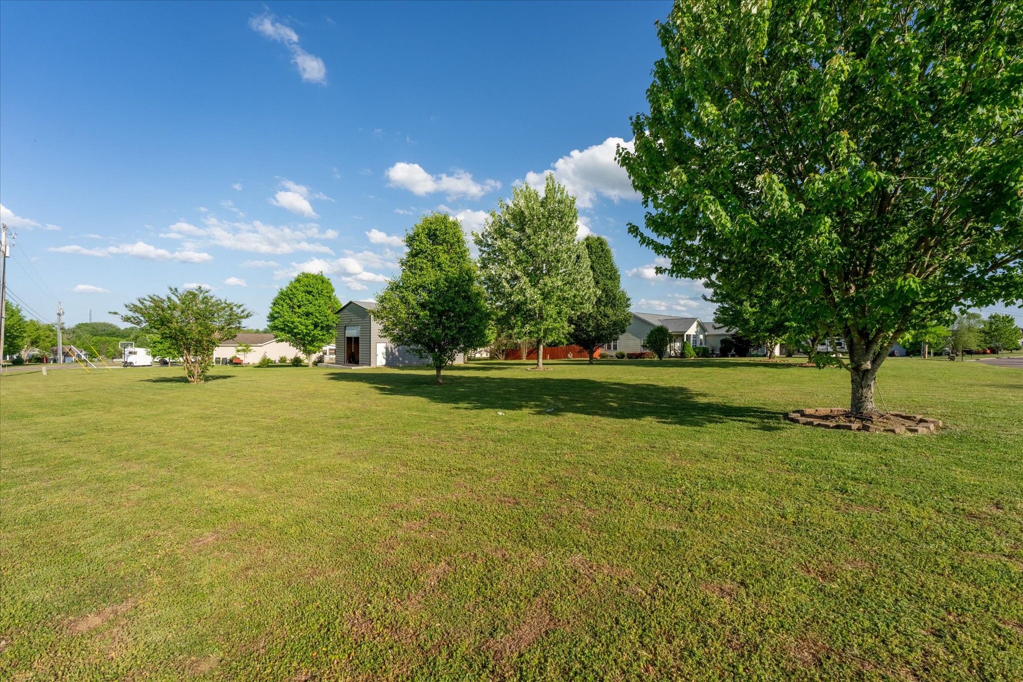 2108 Buckskin Court Spring Hill, TN 37174 - Photo 30 of 39 a view of building with trees in the background