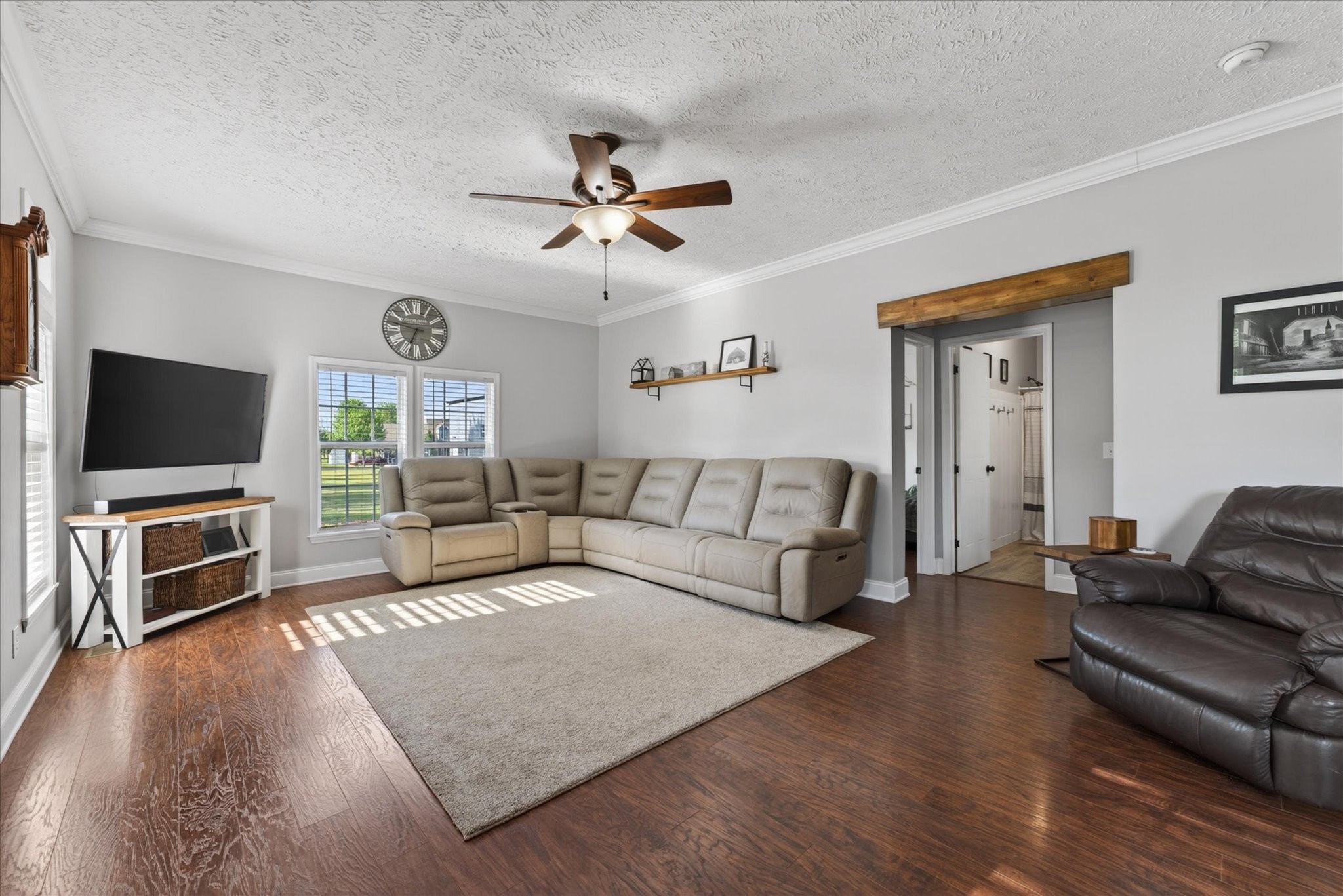 2108 Buckskin Court Spring Hill, TN 37174 - Photo 5 of 39 a living room with furniture and a flat screen tv