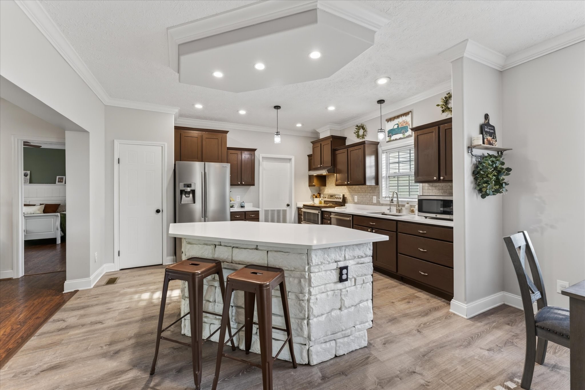 2108 Buckskin Court Spring Hill, TN 37174 - Photo 10 of 39 a kitchen with a table and chairs in it