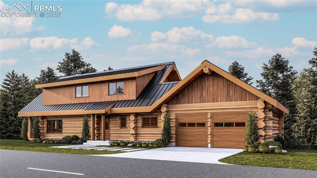 9297 Chipita Park Road Cascade, CO 80809 - Photo 5 of 25 a front view of a house with a garden and plants