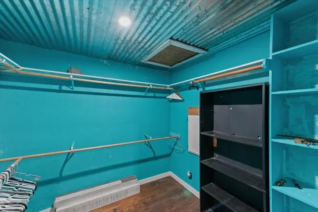 a room with window and a ceiling fan