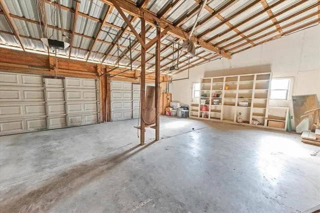 a view of a big room with staircase