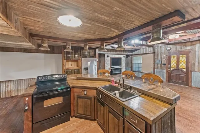 a kitchen with a stove and a sink
