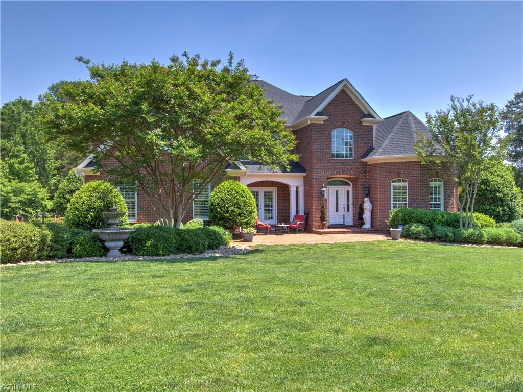 8404 Oakchester Court Oak Ridge, NC 27310 - Photo 2 of 30 Stunning entrance with water fountain.